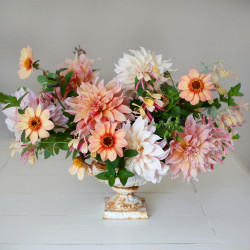 A sophisticated flower arrangement with three types dahlias in shades of cream, pink and peach, featuring the varieties HS Date, Labyrinth and Cafe au Lait.